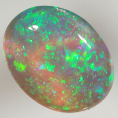 SOLID CRYSTAL OPAL Bright sparkles of greens throughout a purple hue